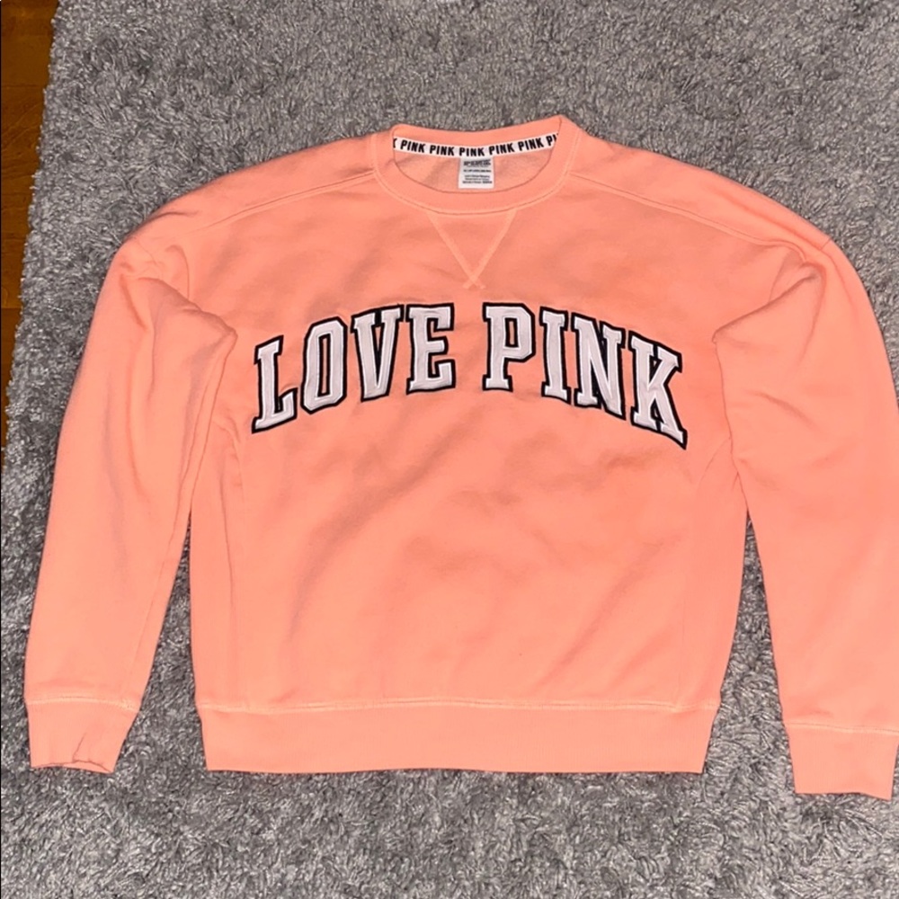 PINK coral sweat shirt.